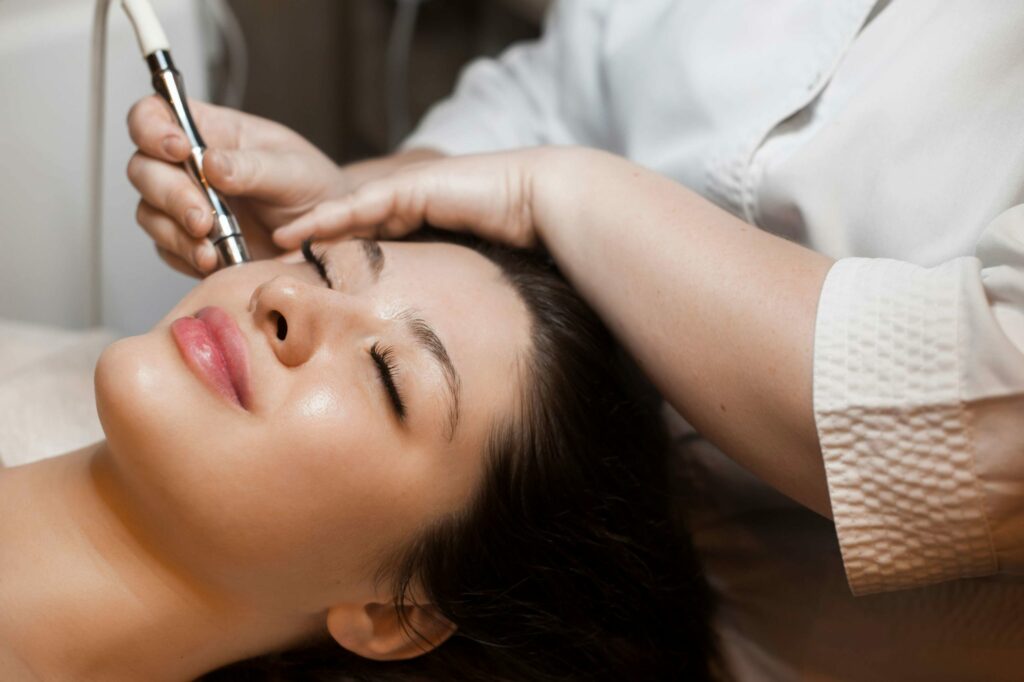 Young Woman Getting Microneedling Treatment | Isya Aesthetics | Vasant Vihar, New Delhi