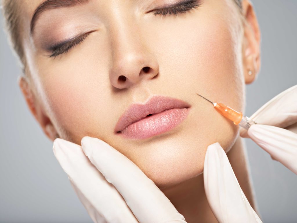 Woman getting cosmetic injection of botox in cheek | Isya Aesthetics | Vasant Vihar, New Delhi